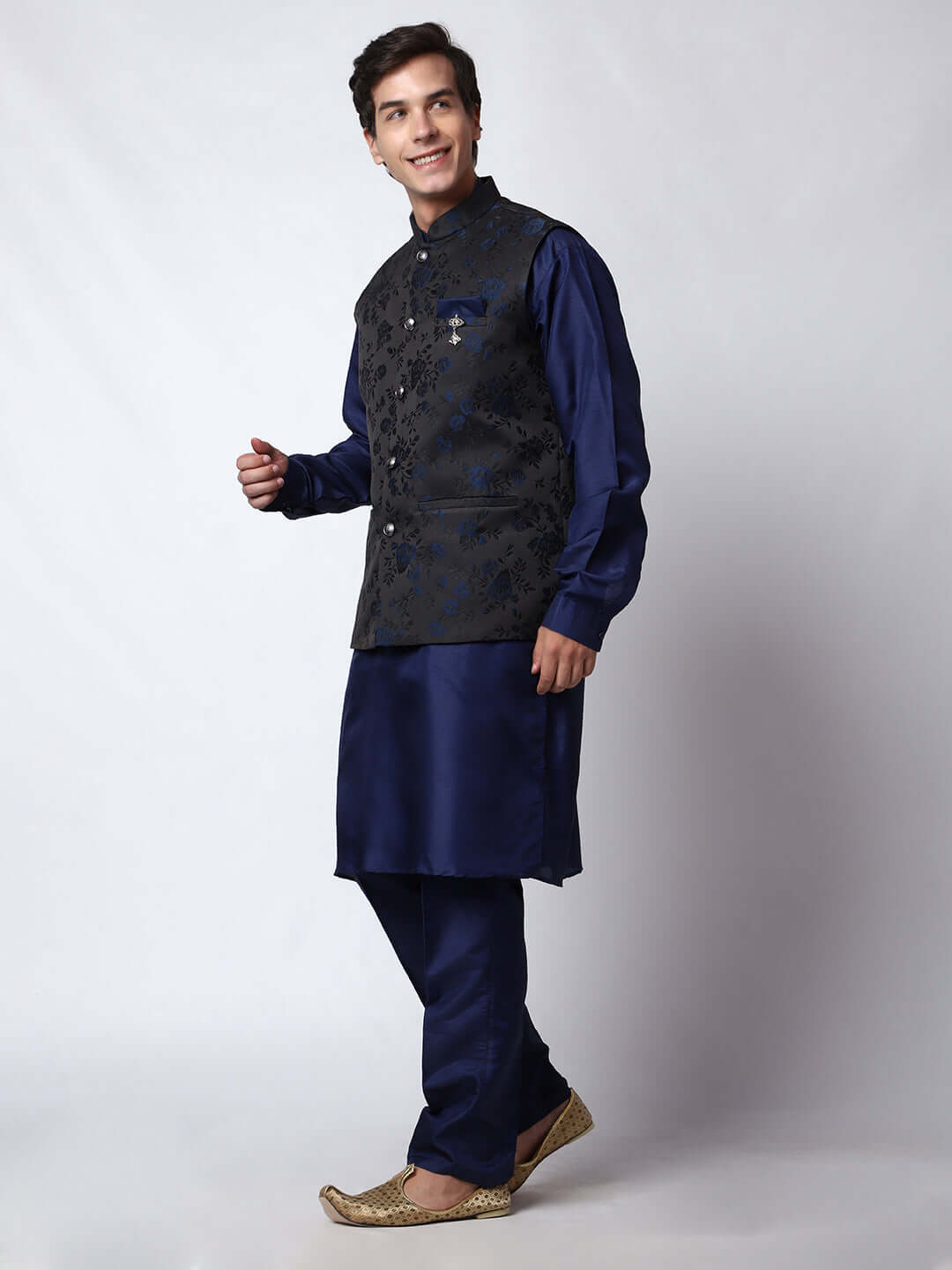 Navy Blue kurta with black nehru jacket for men which is made up of jacquard silk and has floral embroidery on it. Shop this navy blue designer wedding kurta jacket set for male from Crease India website.