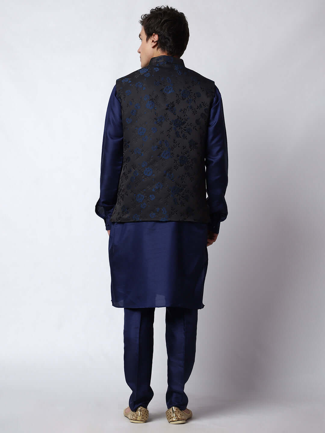 Navy Blue kurta with black nehru jacket for men which is made up of jacquard silk and has floral embroidery on it. Shop this navy blue designer wedding kurta jacket set for male from Crease India website.