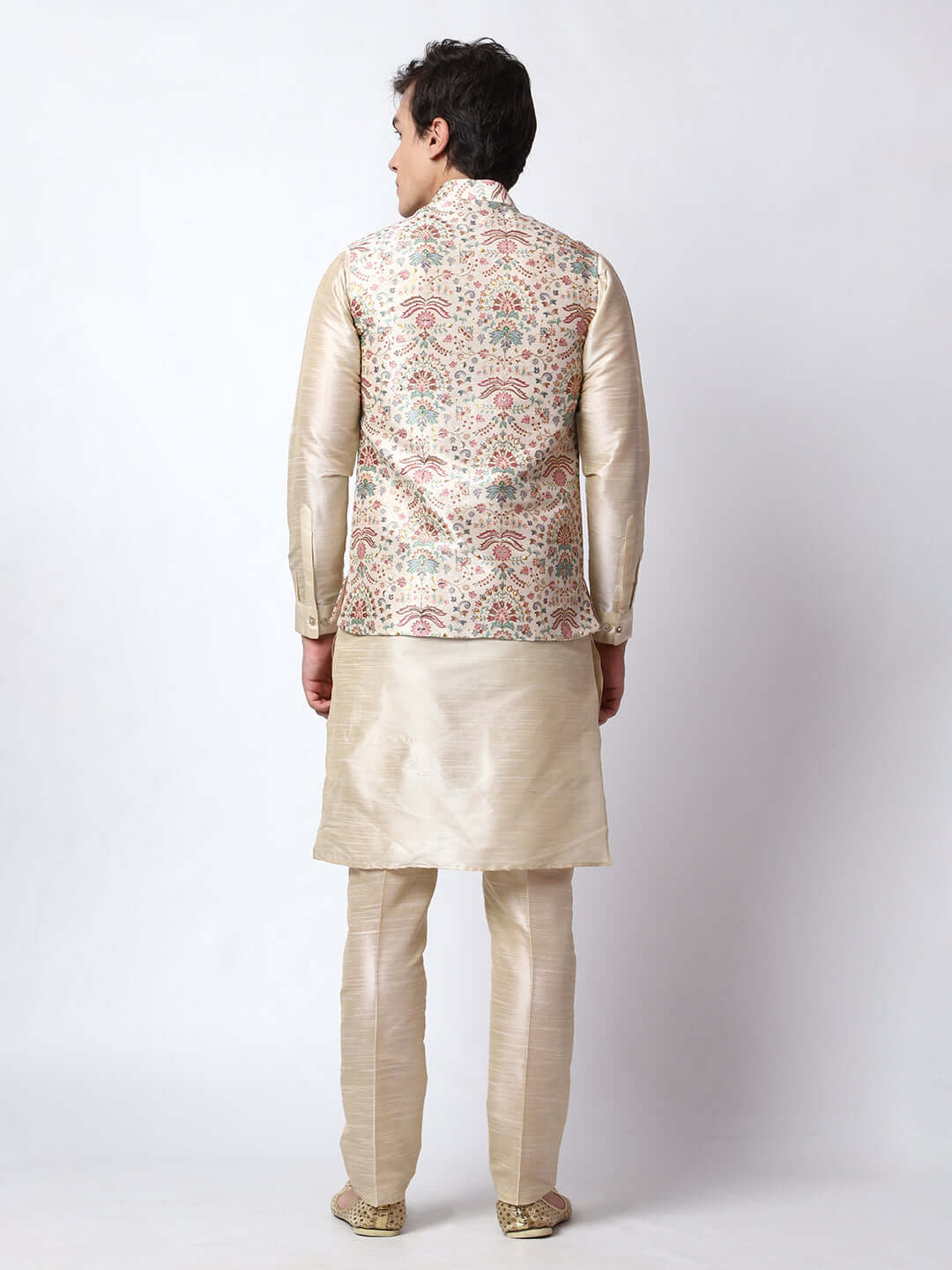 Zari Cream kurta with nehru jacket for men which is made up of dupion silk and has zari embroidery on it. Shop this cream designer wedding kurta jacket set for male from Crease India website.