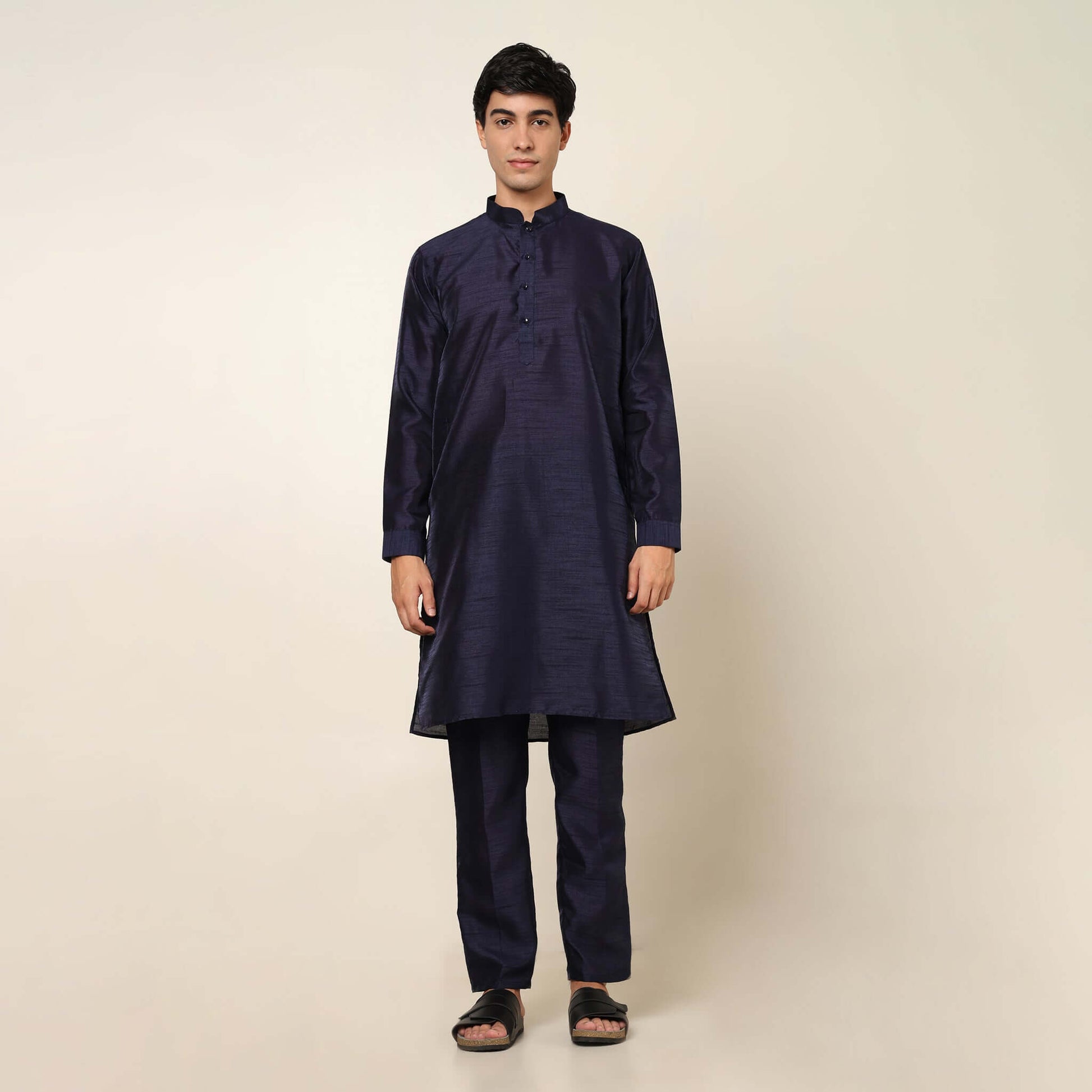 Evening Blue kurta with nehru jacket for men which is made up of dupion silk and has sequence embroidery on it. Shop this evening blue designer wedding kurta jacket set for male from Crease India website.