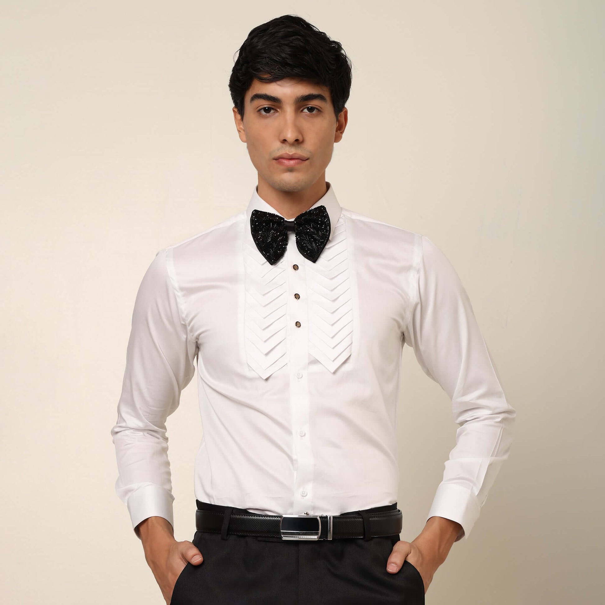 Skyline Designer White Tuxedo Shirt for Men which is made up of cotton and has pleated work at the front. Perfect designer formal wear white shirt for weddings and black tie events by Crease India.