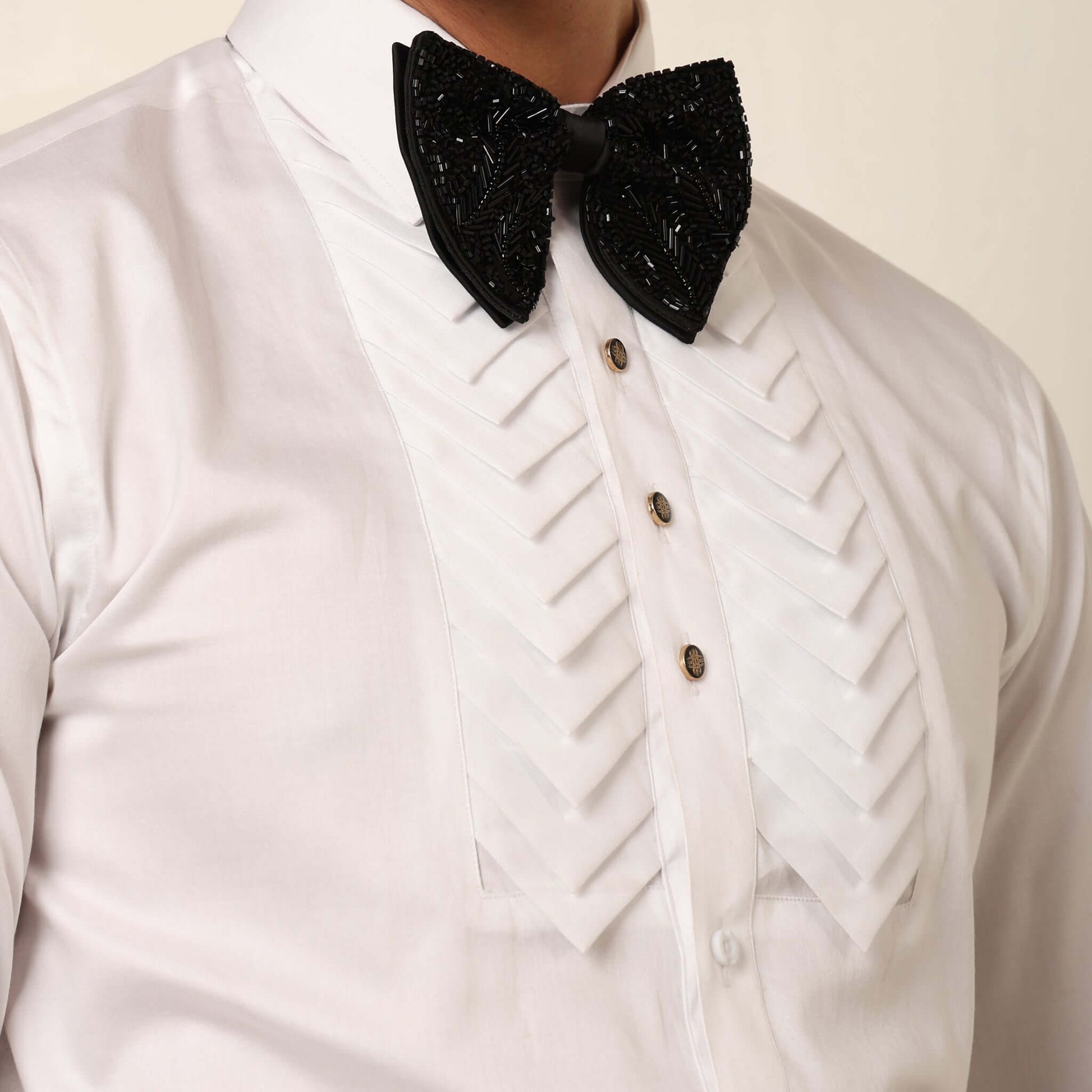Skyline Designer White Tuxedo Shirt for Men which is made up of cotton and has pleated work at the front. Perfect designer formal wear white shirt for weddings and black tie events by Crease India.