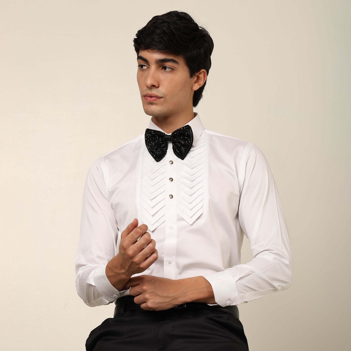 Skyline Designer White Tuxedo Shirt for Men which is made up of cotton and has pleated work at the front. Perfect designer formal wear white shirt for weddings and black tie events by Crease India.