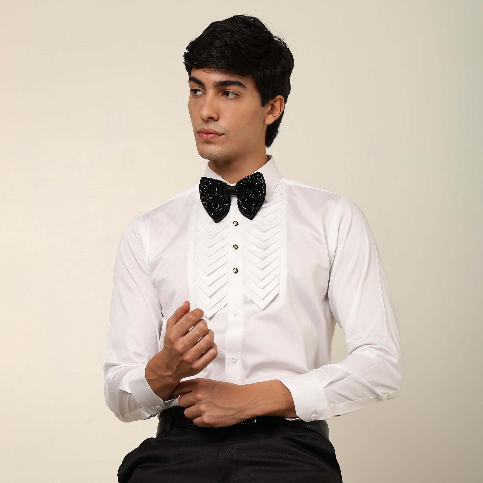 Skyline Designer White Tuxedo Shirt for Men which is made up of cotton and has pleated work at the front. Perfect designer formal wear white shirt for weddings and black tie events by Crease India.