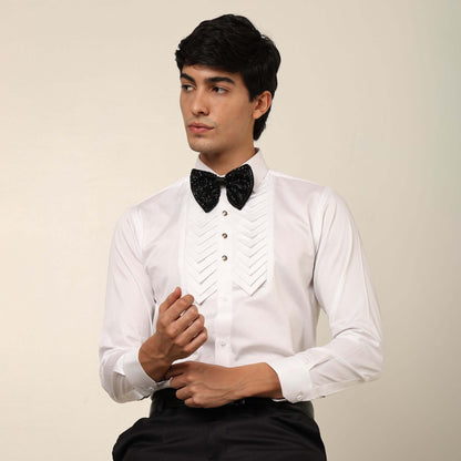 Skyline Designer White Tuxedo Shirt for Men which is made up of cotton and has pleated work at the front. Perfect designer formal wear white shirt for weddings and black tie events by Crease India.