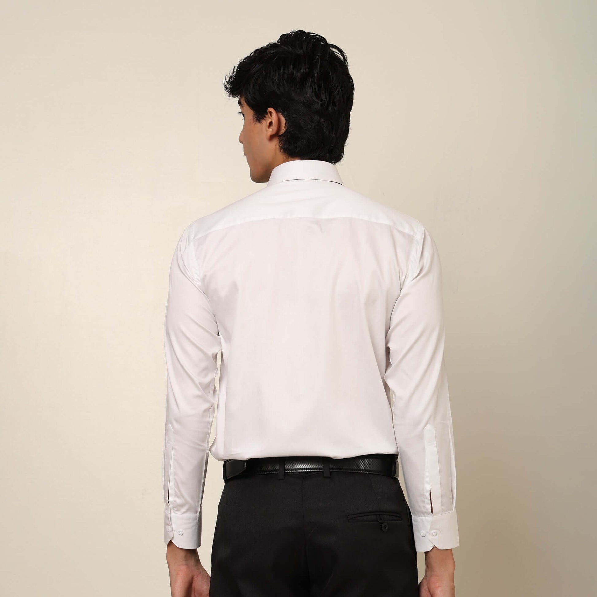 Skyline Designer White Tuxedo Shirt for Men which is made up of cotton and has pleated work at the front. Perfect designer formal wear white shirt for weddings and black tie events by Crease India.