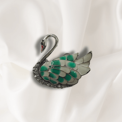 Men's Swan Brooch Lapel Pin for Tuxedos Suits Blazers and Kurtas on a white fabric.