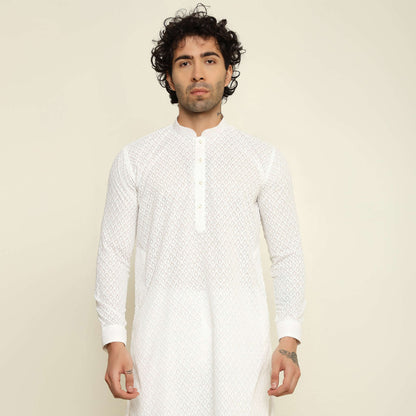 NAQSH White Chikankari Kurta for Men which has chikankari embroidery. Perfect mens white wedding kurta for male by Crease India.