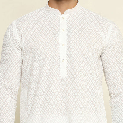NAQSH White Chikankari Kurta for Men which has chikankari embroidery. Perfect mens white wedding kurta for male by Crease India.