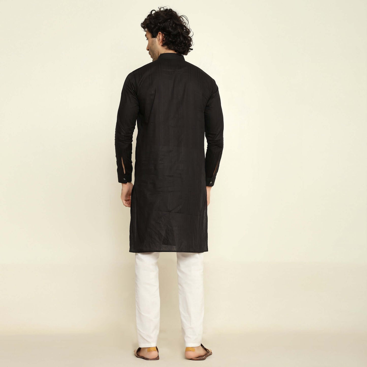NAQSH Black Jacquard Cotton Kurta Set for Men which has jacquard design. Perfect mens black wedding kurta for male by Crease India.