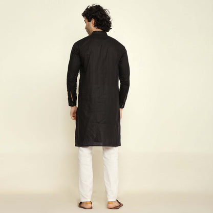 NAQSH Black Jacquard Cotton Kurta Set for Men which has jacquard design. Perfect mens black wedding kurta for male by Crease India.
