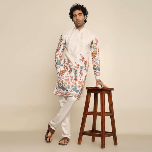 White Floral Embroidered Kurta for Men which has tiger motif & floral embroidery. Perfect mens wedding kurta for male by Crease India.