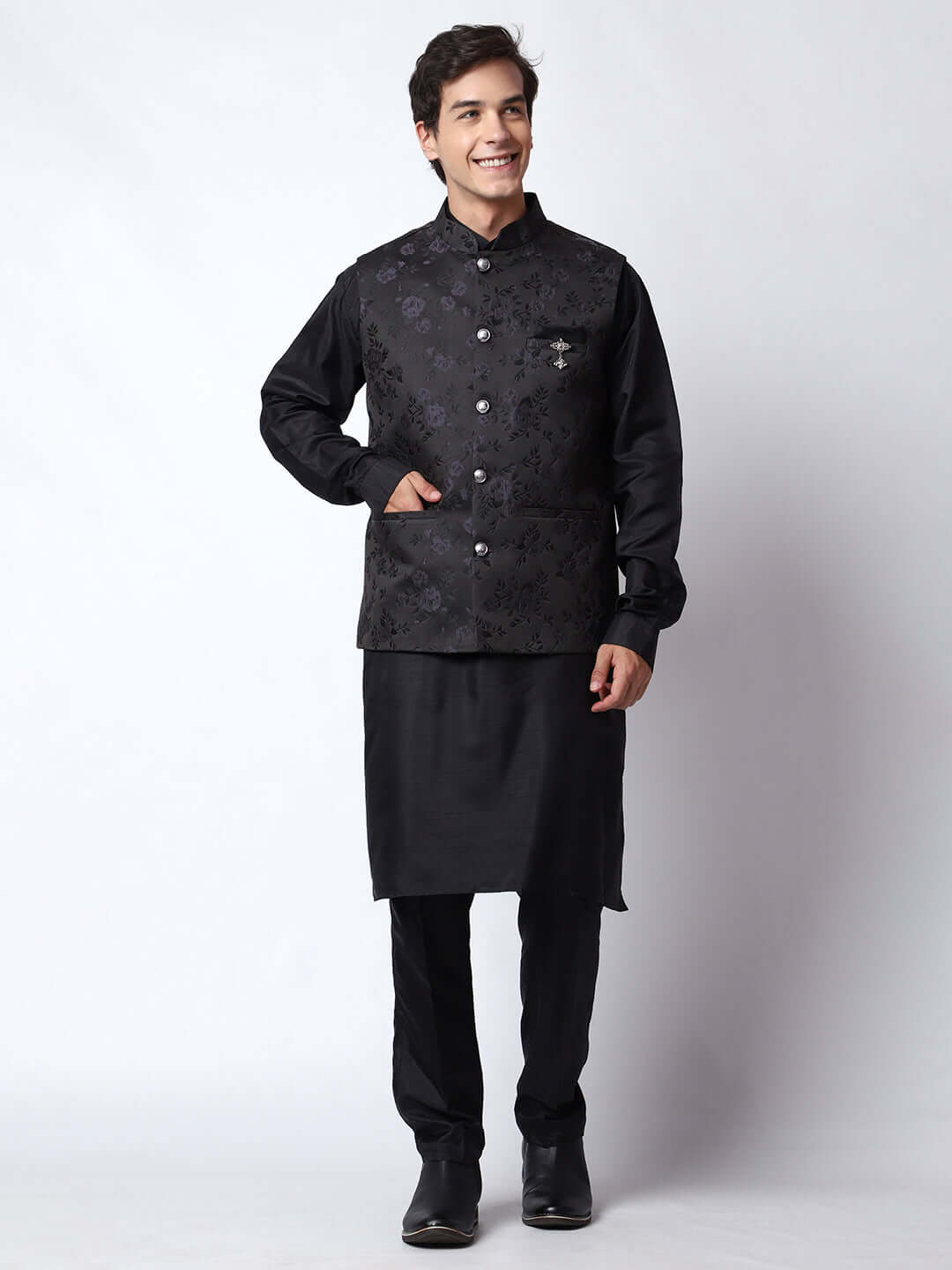 Black kurta with black nehru jacket for men which is made up of dupion silk and has motif designs on it. Shop this black designer wedding kurta jacket set for male from Crease India website.