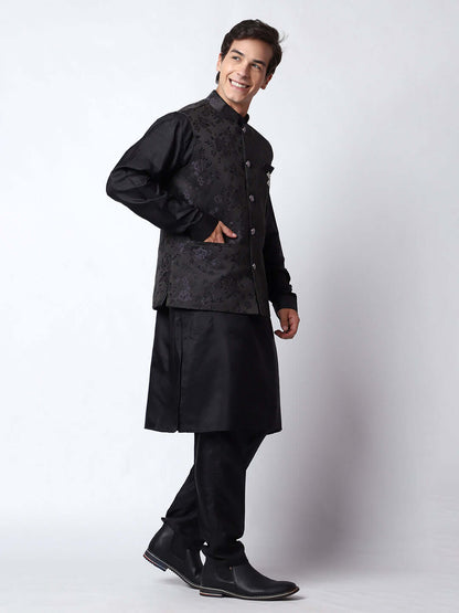  Black kurta with black nehru jacket for men which is made up of dupion silk and has motif designs on it. Shop this black designer wedding kurta jacket set for male from Crease India website.