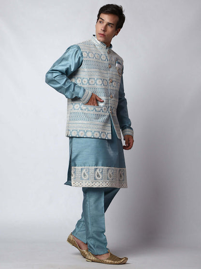 Turquoise Blue kurta with blue nehru jacket for men which is made up of dupion silk and has net embroidery with sequins on it. Shop this turquoise blue designer wedding kurta jacket set for male from Crease India website.
