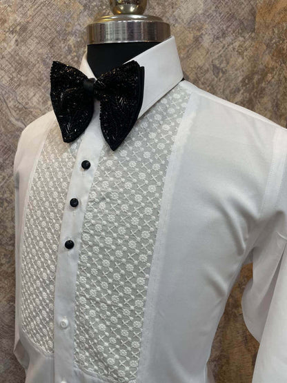 Chikankari Designer White Tuxedo Shirt for Men which is made up of cotton and has chikankari work at the front. Perfect designer formal wear white shirt for weddings and black tie events by Crease India.