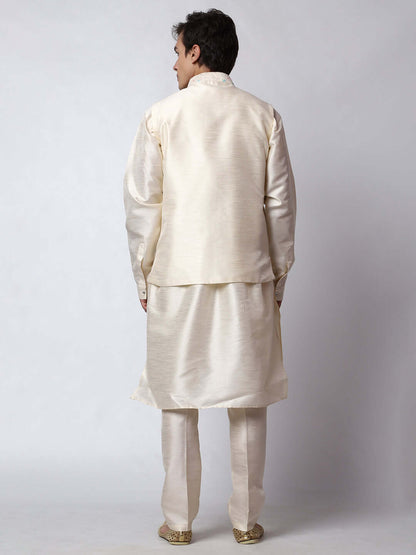 Cream kurta with nehru jacket for men which is made up of dupion silk and has multicolored thread embroidery on it. Shop this cream designer wedding kurta jacket set for male from Crease India website.