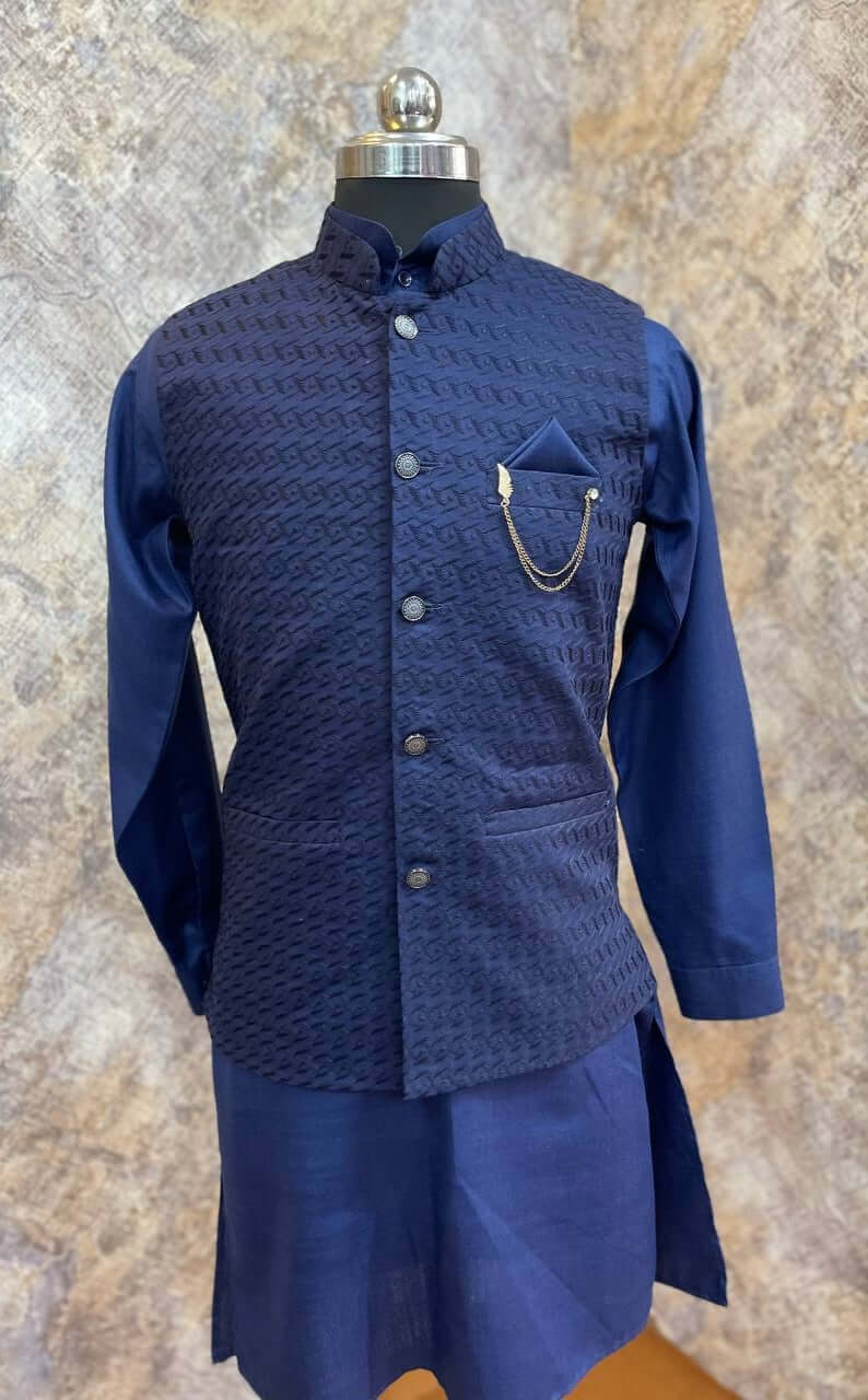 Deep Blue kurta with blue nehru jacket for men which is made up of voile cotton and has chikankari embroidery on it. Shop this deep blue designer wedding kurta jacket set for male from Crease India website.