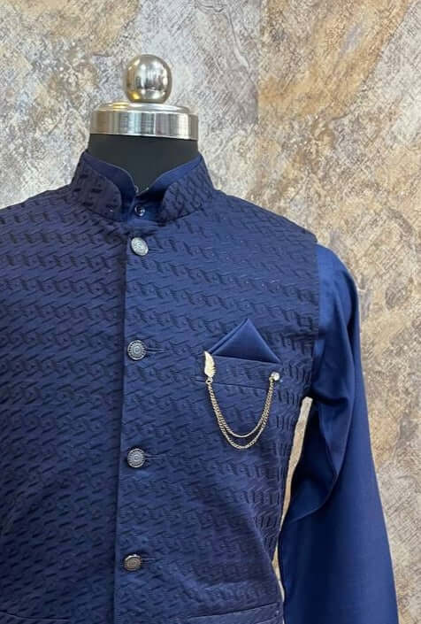 Deep Blue kurta with blue nehru jacket for men which is made up of voile cotton and has chikankari embroidery on it. Shop this deep blue designer wedding kurta jacket set for male from Crease India website.