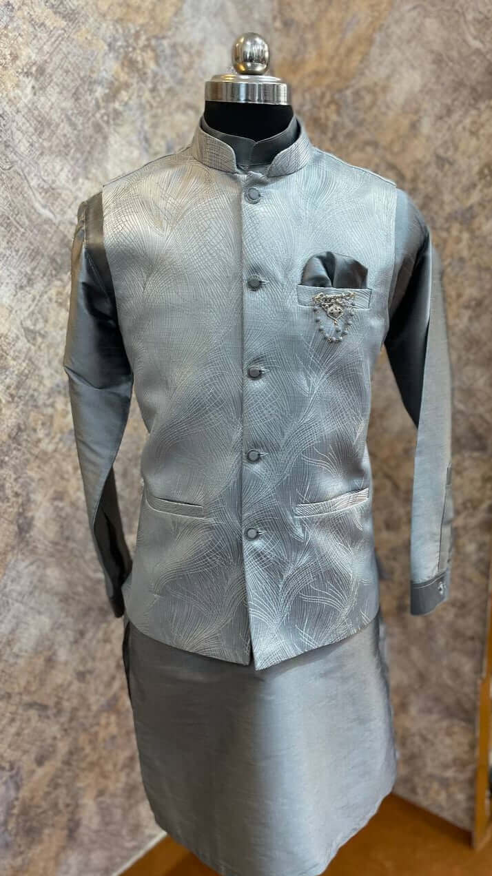 Grey kurta with nehru jacket for men which is made up of imported italian jacquard and has abstract designs on it. Shop this grey designer wedding kurta jacket set for male from Crease India website.