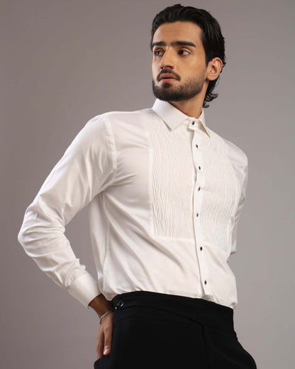 Model posing to his right in Men’s Ripple White Formal Tuxedo Shirt by Crease India