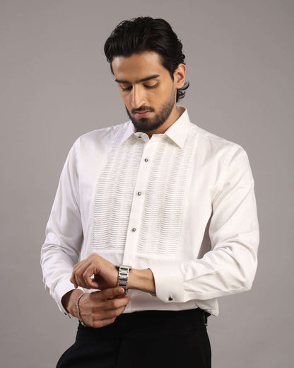 Model adjusting watch wearing Men’s White Accordion Pleated Tuxedo Shirt by Crease India