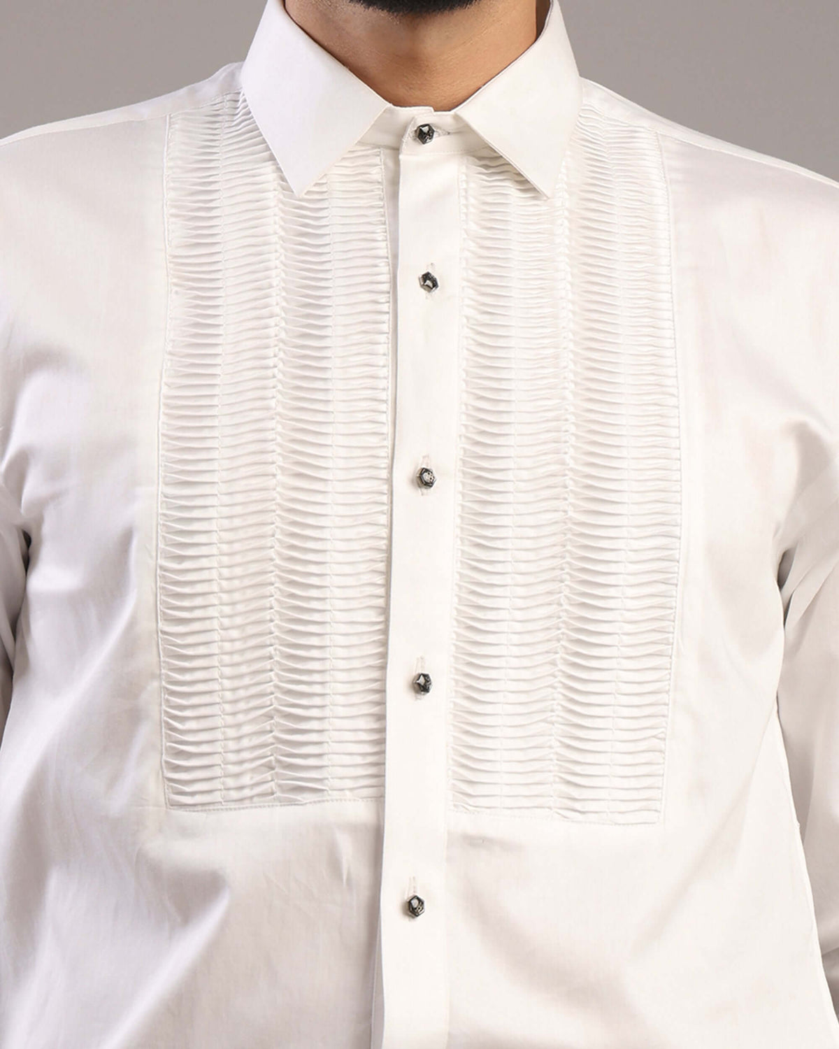 Close-up details of accordion pleats and collar on Men’s White Tuxedo Shirt by Crease India